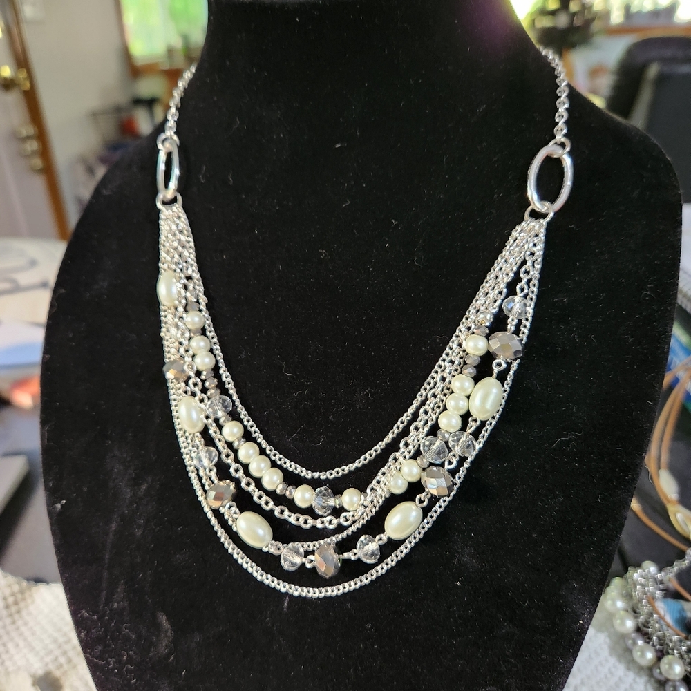 Elegant Silver and Pearl Multi-Strand Necklace